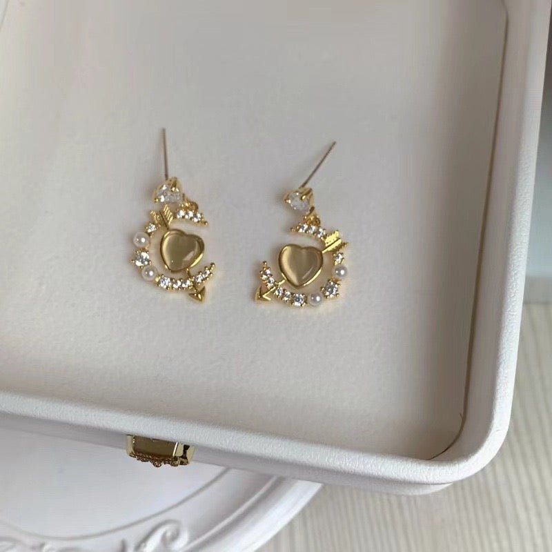 [Beispielverkauf] Herz- und Pfeilohrringe