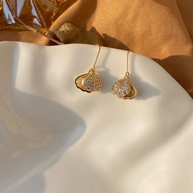 Perlenohrringe mit Meereslandschaft