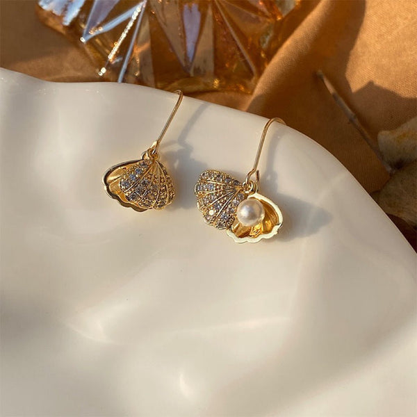 Perlenohrringe mit Meereslandschaft