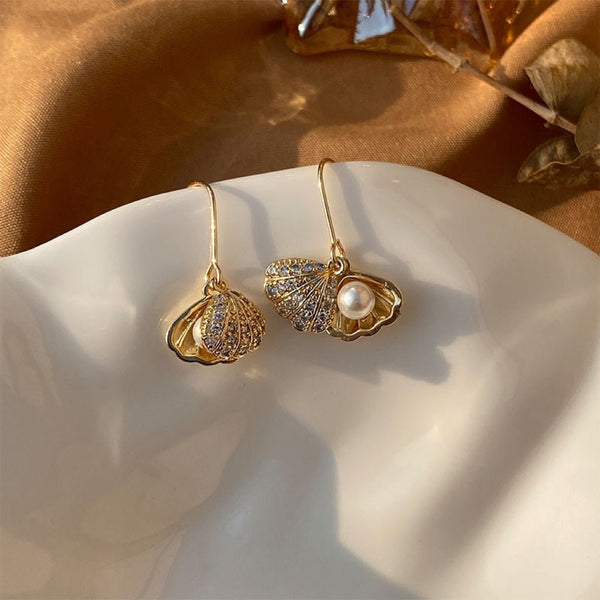 Perlenohrringe mit Meereslandschaft