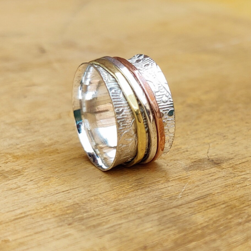 Drehring aus Silber und Messing