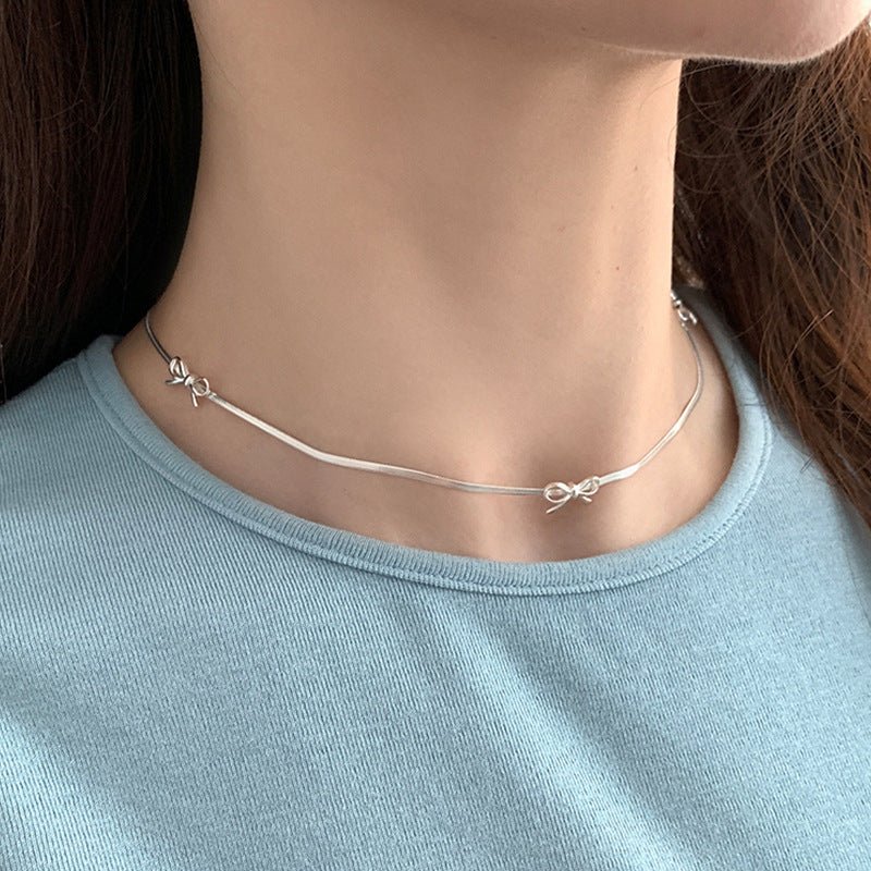 Silberne Halskette mit Schleife