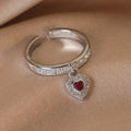 Silberner Ring mit Herzanhänger