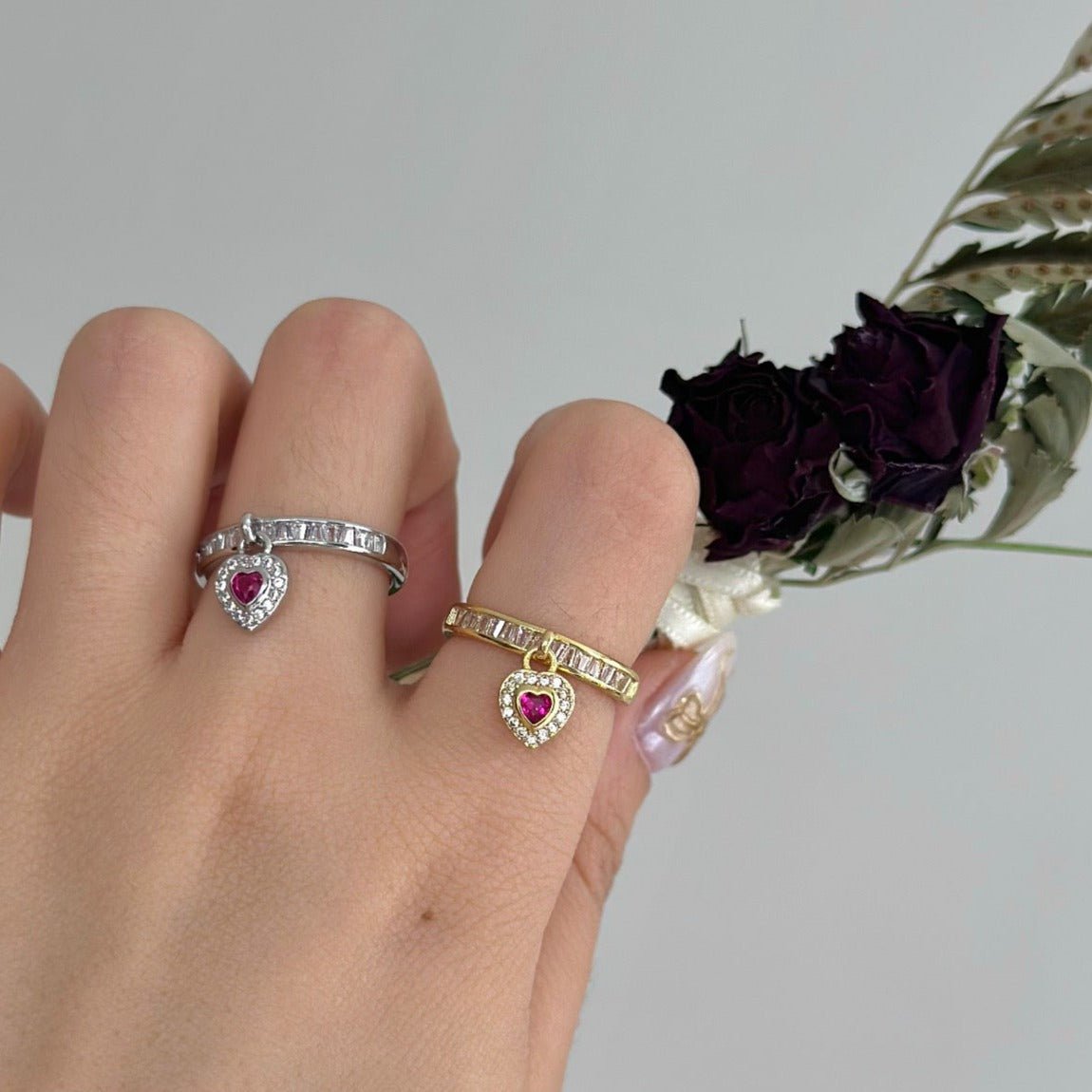 Silberner Ring mit Herzanhänger