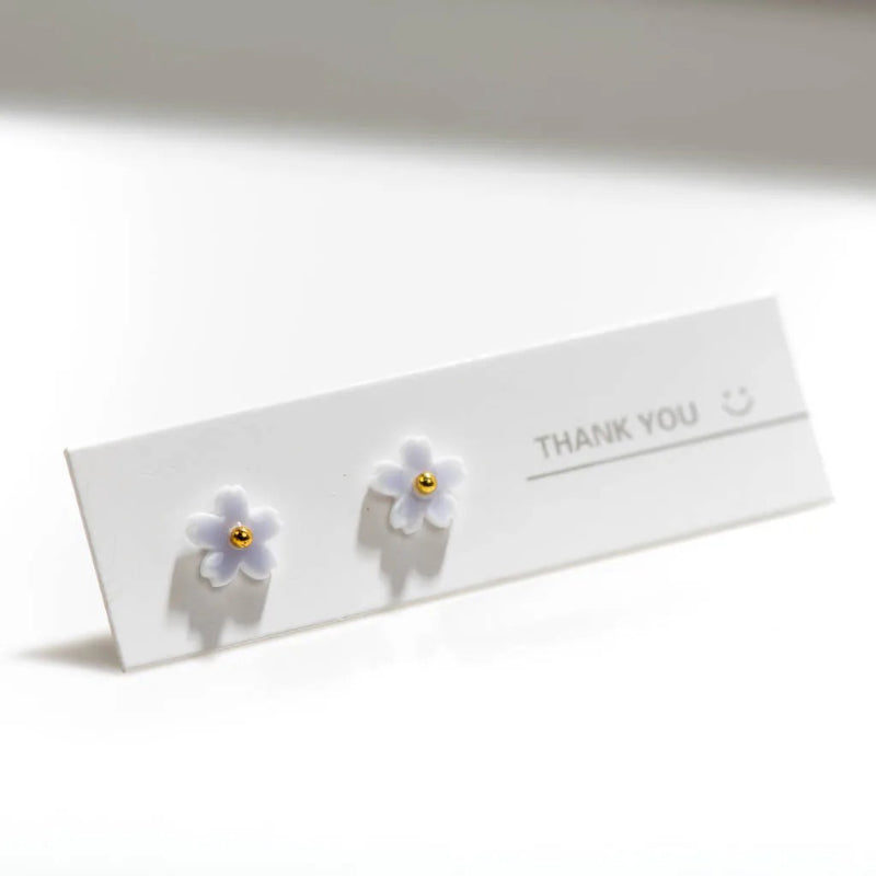 Kleine und Mini-Ohrstecker mit mehrfarbiger Keramikblume