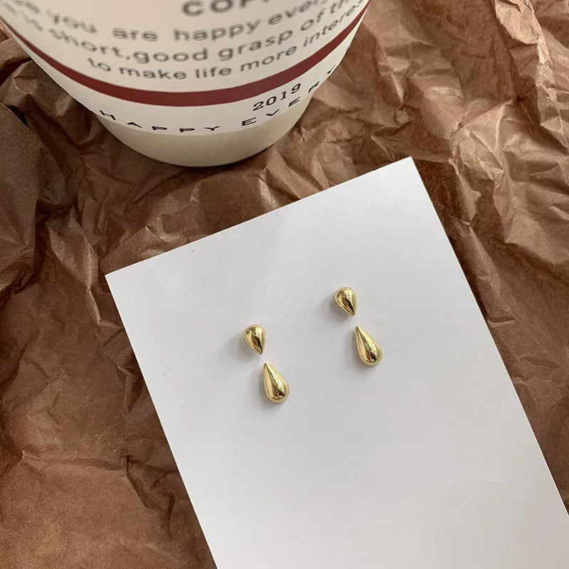 Ungewöhnliche kleine Ohrstecker in Tropfenform