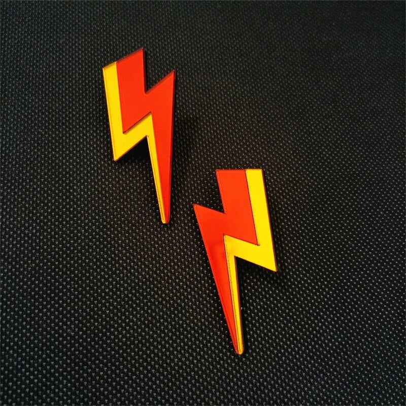 Mehrfarbige Glitzer-Ohrstecker aus Acryl mit Blitz