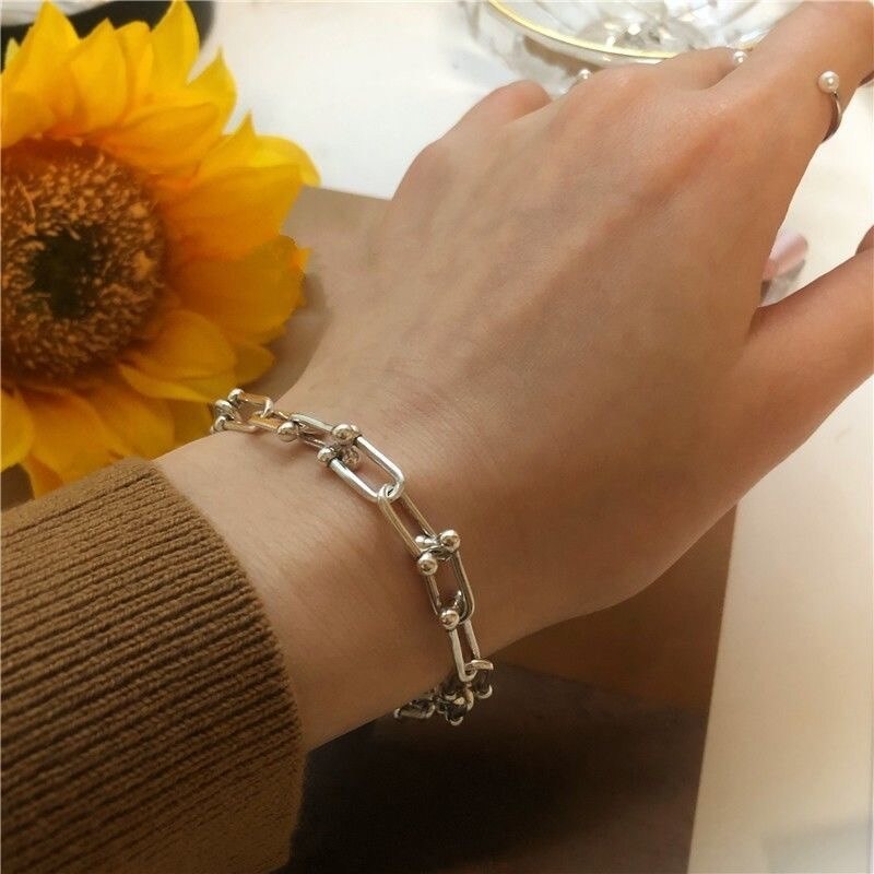 Mehrlagige, dick vergoldete Kettenarmbänder