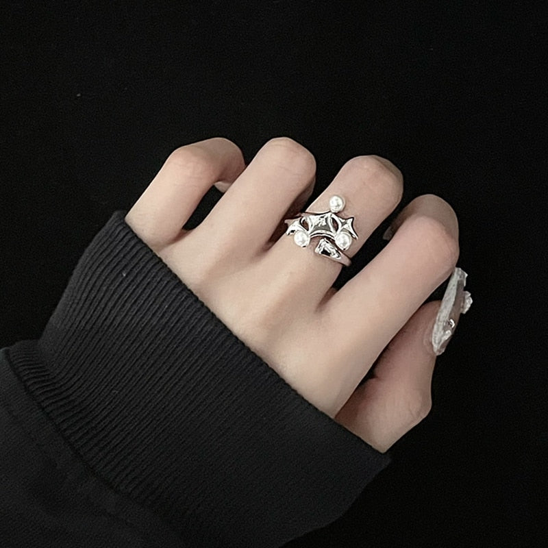 Kollektion unregelmäßiger Kreuzstern-Mondsteinringe