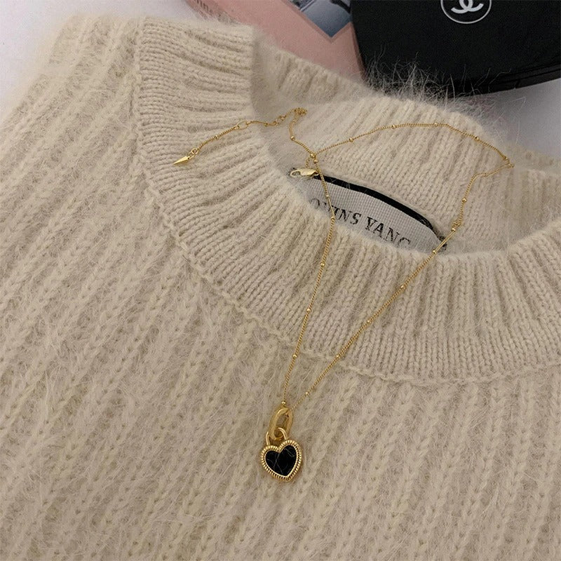 Doppelseitige Halskette mit schwarzem und weißem Mini-Herz-Anhänger