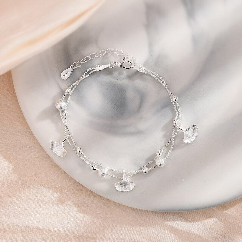 Armband aus Sterlingsilber mit doppeltem Liebesherz und hohlen runden Perlen