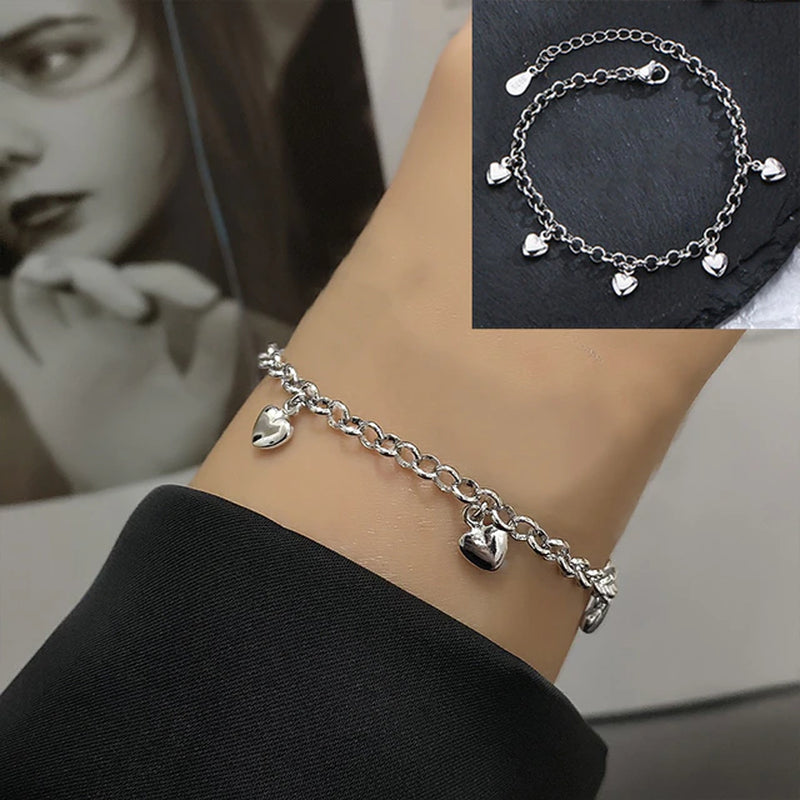 Armband aus Sterlingsilber mit doppeltem Liebesherz und hohlen runden Perlen