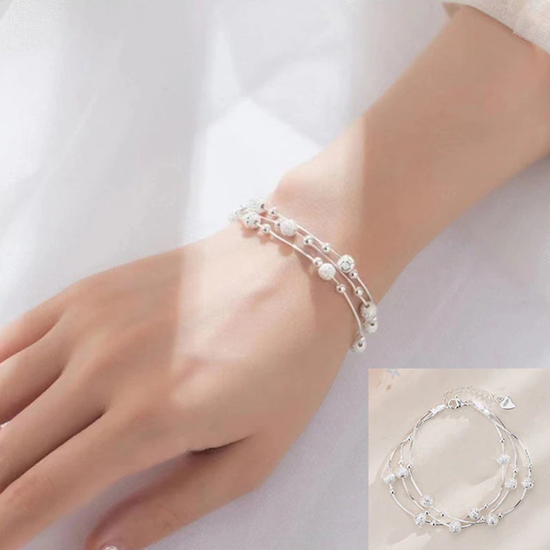 Armband aus Sterlingsilber mit doppeltem Liebesherz und hohlen runden Perlen