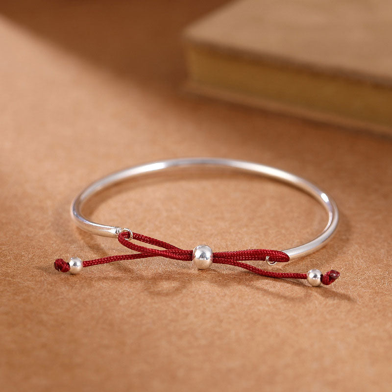 Chavri-Armband aus 925er-Sterlingsilber mit roter Schnur und heilendem Knoten