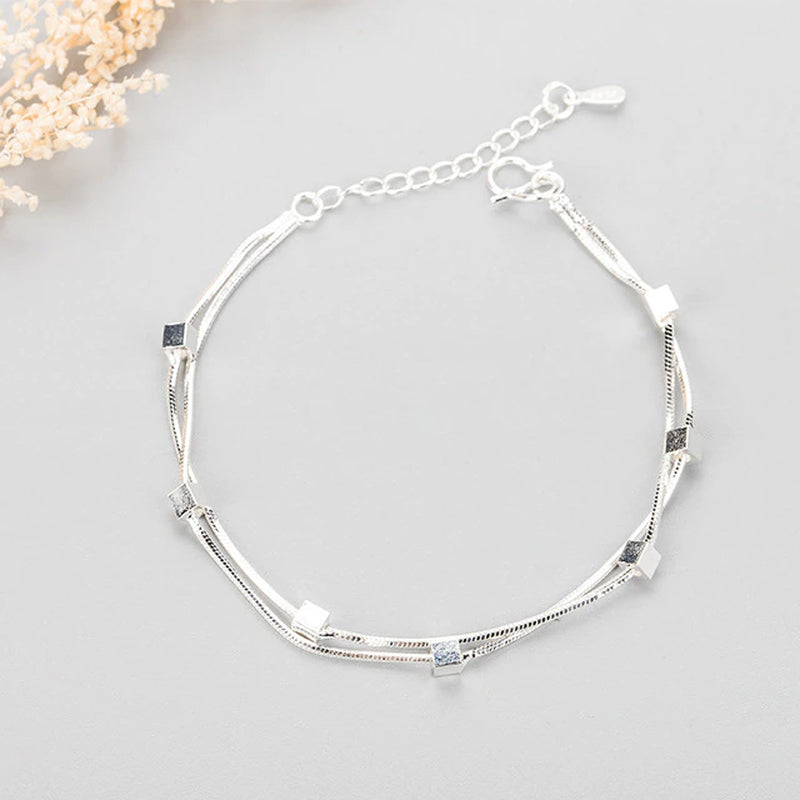 Armband aus Sterlingsilber mit doppeltem Liebesherz und hohlen runden Perlen
