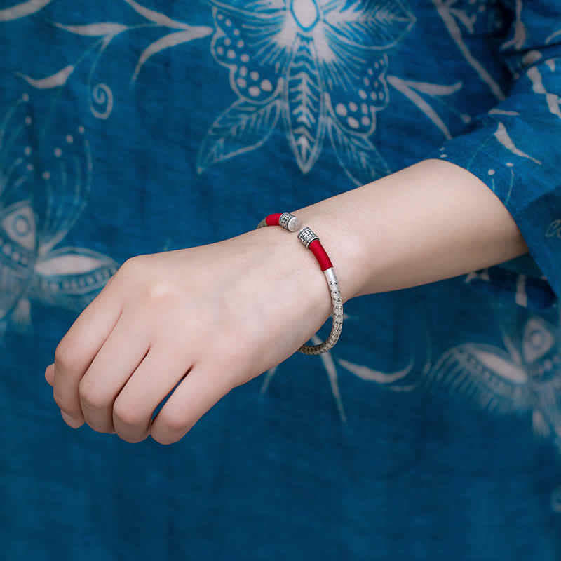 Chavri Tibet Om Mani Padme Hum Glücksarmband mit roter Schnur