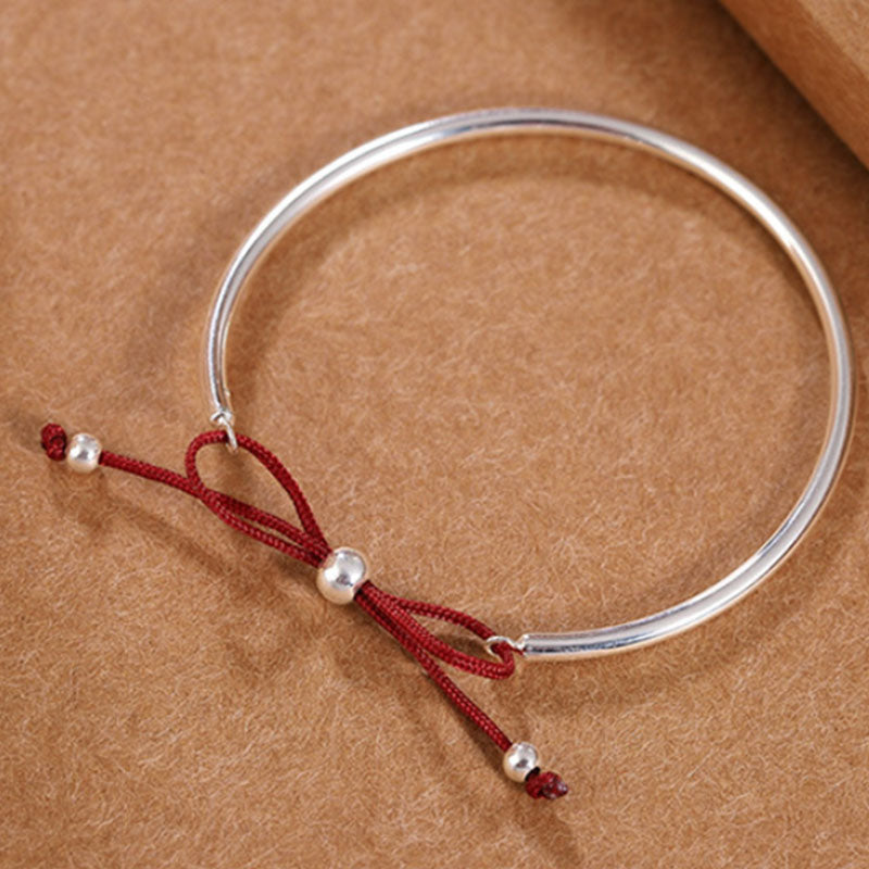 Chavri-Armband aus 925er-Sterlingsilber mit roter Schnur und heilendem Knoten