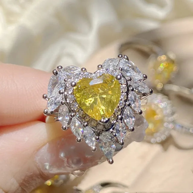 Eleganter Damenring mit gelbem Kristall und geometrischem Design