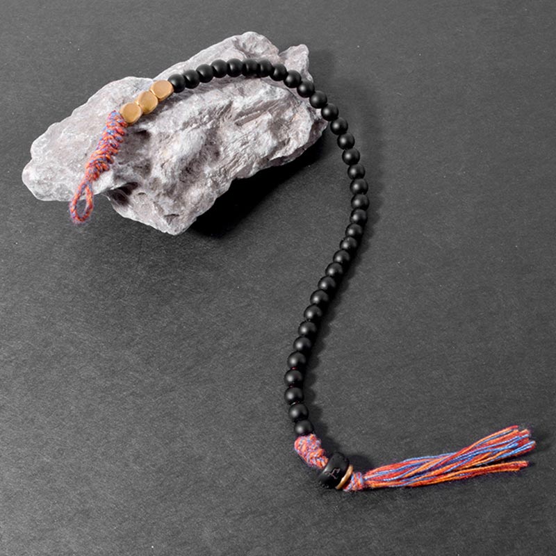 Handgefertigtes Chavri-Quastenarmband aus tibetischem schwarzem Onyx