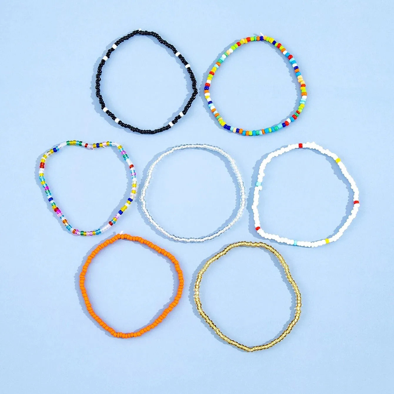 Bunte elastische Fußkettchen mit Perlen - 7-teiliges Set