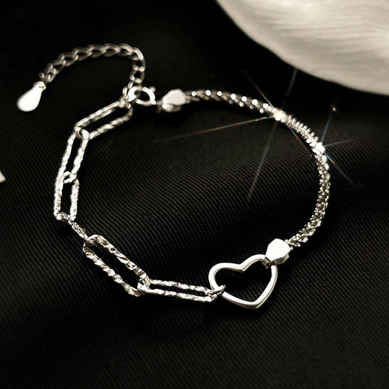 Armband aus Sterlingsilber mit doppeltem Liebesherz und hohlen runden Perlen