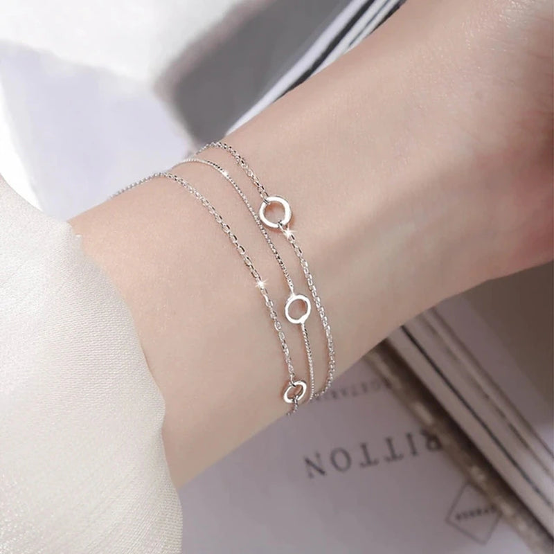 Armband aus Sterlingsilber mit doppeltem Liebesherz und hohlen runden Perlen