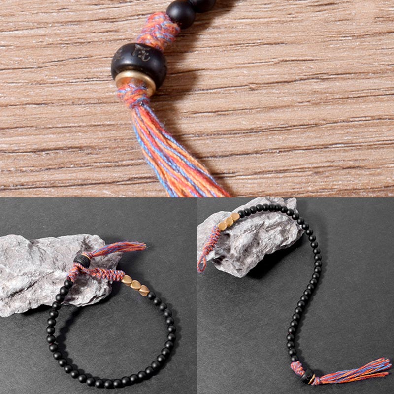 Handgefertigtes Chavri-Quastenarmband aus tibetischem schwarzem Onyx