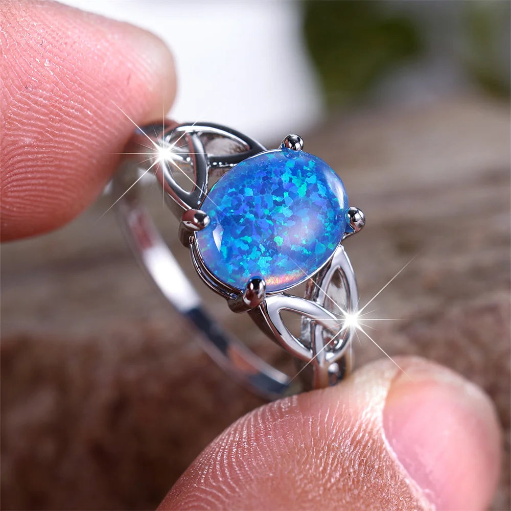 Vintage Silberfarbener Verlobungsring mit blauem Opal und Kreuzmuster für Damen