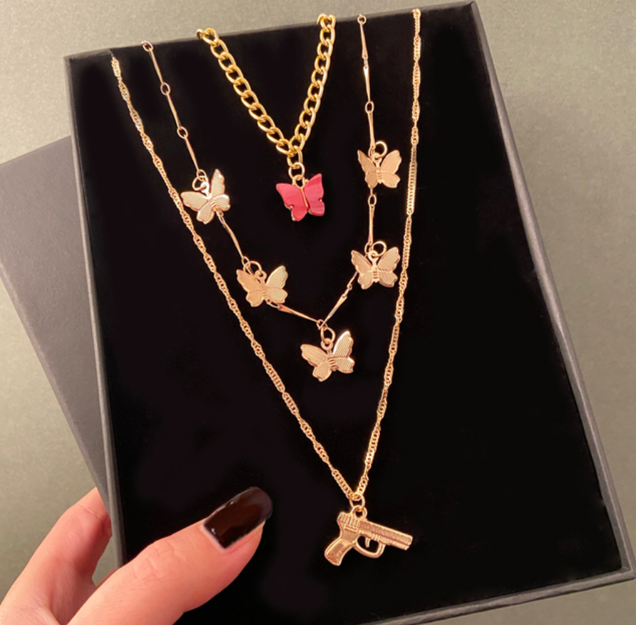 Pistole Kettenset mit Schmetterlingen