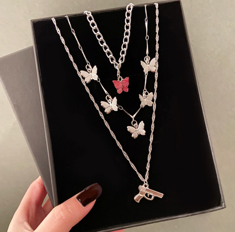 Pistole Kettenset mit Schmetterlingen