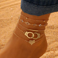 Boho Mehrschichtiges Fußkettchen für Damen mit Liebesform-Metallanhänger
