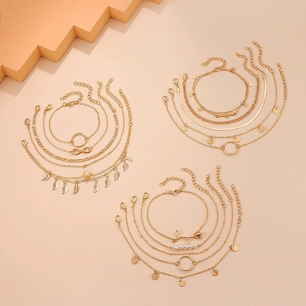 Boho Mehrschichtiges Fußkettchen für Damen mit Liebesform-Metallanhänger