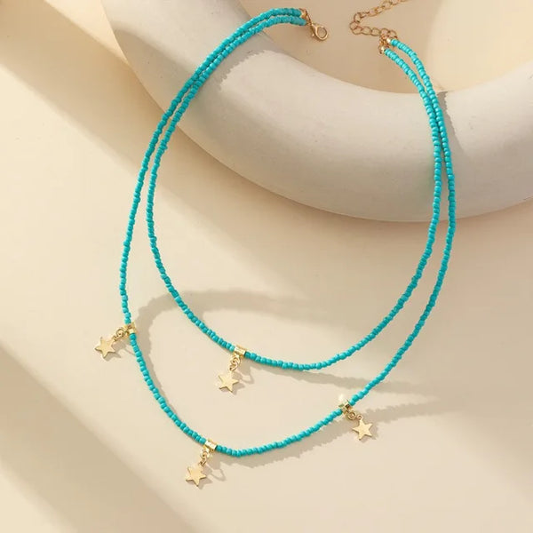 Bohemian Reisepärlchen Mehrschichtiger Pentagramm Anhänger Halskette für Frauen Mädchen Urlaub OL Geschenk Modeschmuck AN021