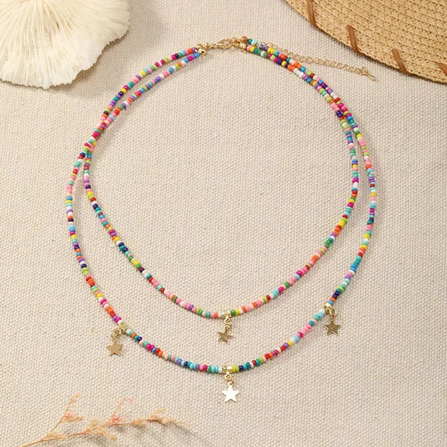 Bohemian Reisepärlchen Mehrschichtiger Pentagramm Anhänger Halskette für Frauen Mädchen Urlaub OL Geschenk Modeschmuck AN021