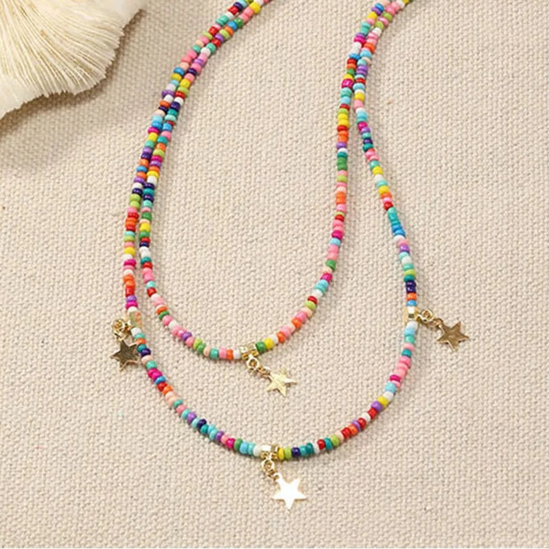 Bohemian Reisepärlchen Mehrschichtiger Pentagramm Anhänger Halskette für Frauen Mädchen Urlaub OL Geschenk Modeschmuck AN021