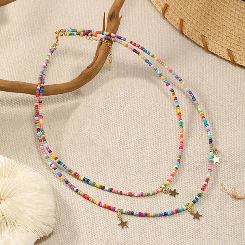 Bohemian Reisepärlchen Mehrschichtiger Pentagramm Anhänger Halskette für Frauen Mädchen Urlaub OL Geschenk Modeschmuck AN021