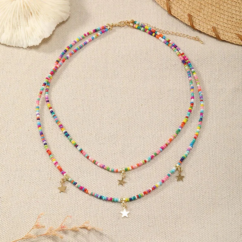 Bohemian Reisepärlchen Mehrschichtiger Pentagramm Anhänger Halskette für Frauen Mädchen Urlaub OL Geschenk Modeschmuck AN021