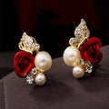 Elegante Damenohrringe mit roter Rose und Schmetterling