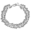 Armband mit silbernen Kugeln