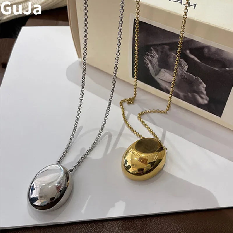Beliebter Modeschmuck: Halskette mit glattem ovalen Metallanhänger für Frauen und Mädchen