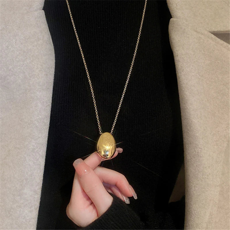 Beliebter Modeschmuck: Halskette mit glattem ovalen Metallanhänger für Frauen und Mädchen