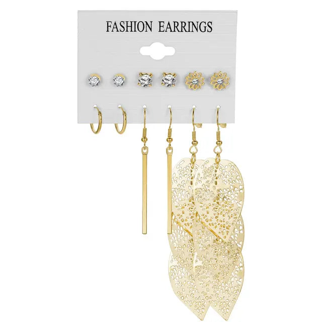 Moderne goldfarbene Metall-Ohrringe für Frauen mit hohlen Blättern, Sternen- und Mondanhängern, geometrischen Ohrsteckern, Schmuckgeschenk