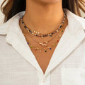 Boho Handgemachte Perlenkette mit Quastenanhänger