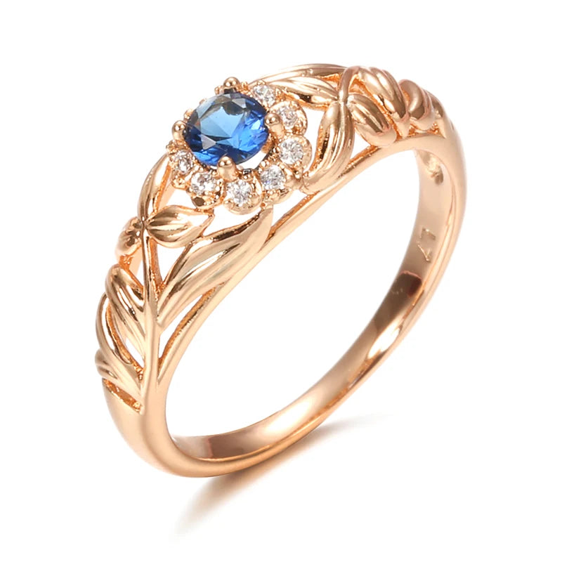 Hochwertiger 585er Roségold Ring mit natürlichen blauen Zirkonen