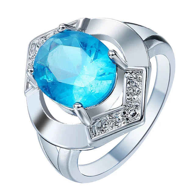 Eleganter Modeschmuck mit blauem Kristallrhinestone in geometrischem Design für Frauen - Silberfarbener Ring für Verlobung, Hochzeit und Jubiläum