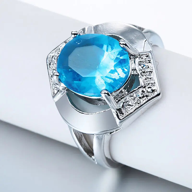 Eleganter Modeschmuck mit blauem Kristallrhinestone in geometrischem Design für Frauen - Silberfarbener Ring für Verlobung, Hochzeit und Jubiläum