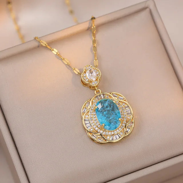 Hochwertige Halskette mit großem ovalen Steinanhänger in Eisblumenoptik für Frauen in Goldfarbe mit blauem und grünem Zirkonia - Hochzeits- und Verlobungsschmuckgeschenk