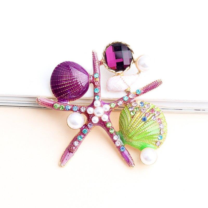 Sternenfische Und Muschelbroschen Auf Der Ozeanserie