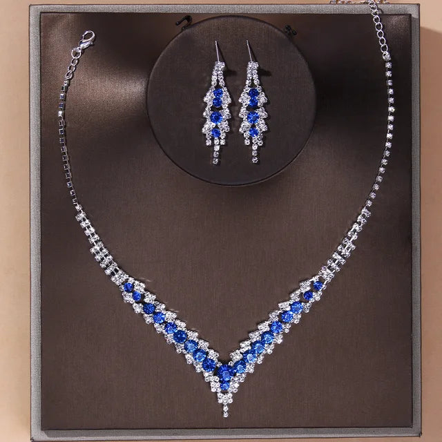 Elegantes blaues Strass-Kristall-Hochzeitsschmuck-Set für Frauen, versilbertes V-förmiges Choker-Halskette-Ohrring-Set