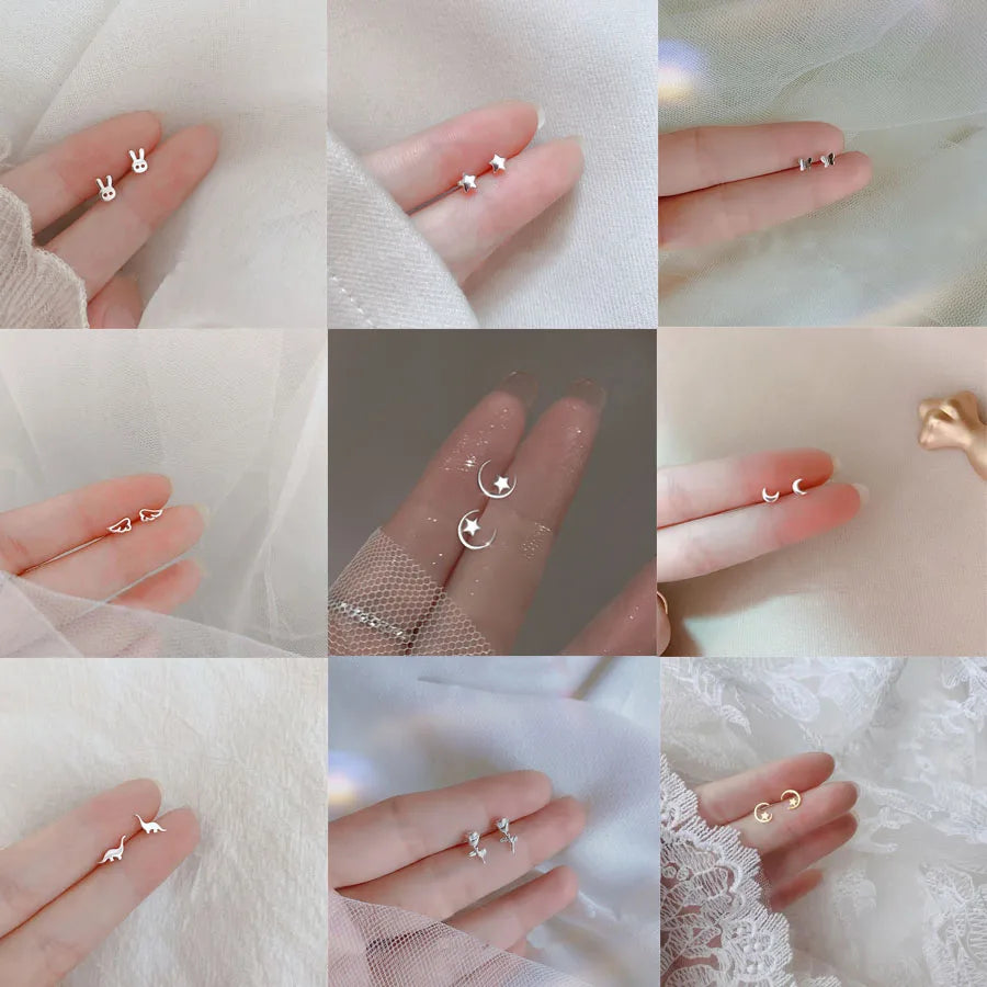Zarte minimalistische versilberte Ohrstecker für Frauen mit kleinen Herz-, Mond-, Stern- und Hasenmotiven